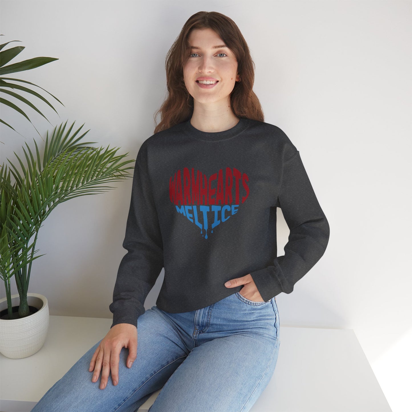 Warm Hearts Melt Ice Unisex Heavy Blend™ Crewneck Sweatshirt