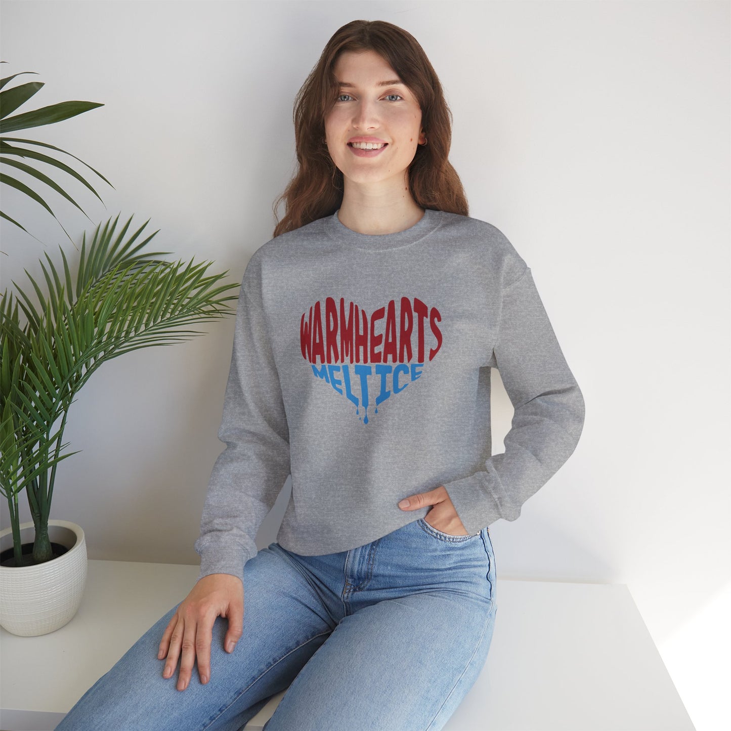 Warm Hearts Melt Ice Unisex Heavy Blend™ Crewneck Sweatshirt