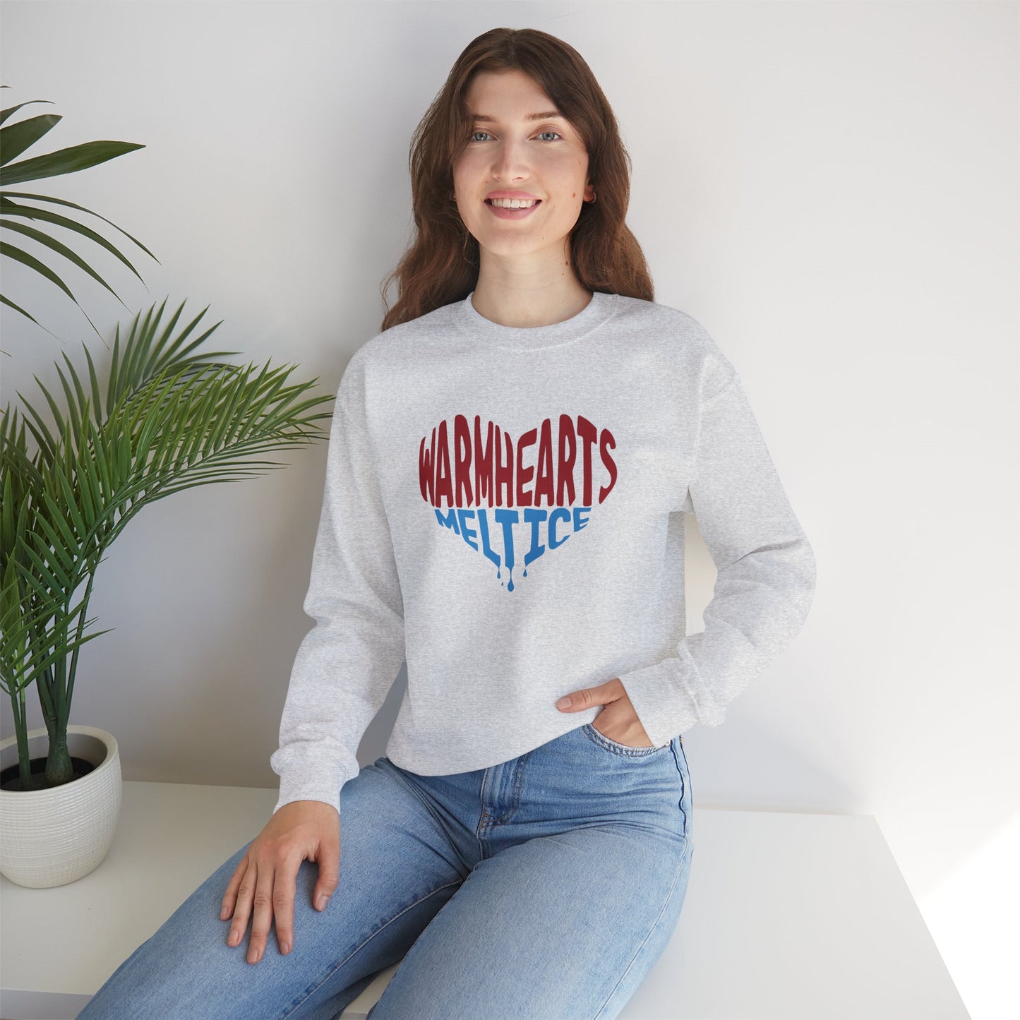 Warm Hearts Melt Ice Unisex Heavy Blend™ Crewneck Sweatshirt