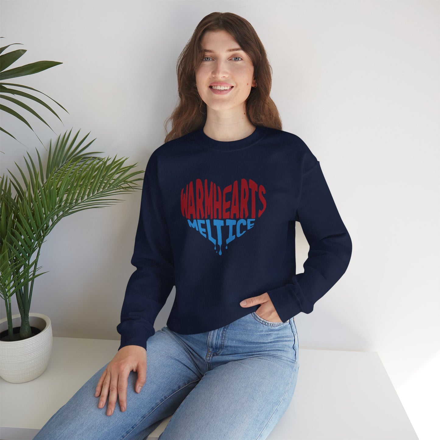 Warm Hearts Melt Ice Unisex Heavy Blend™ Crewneck Sweatshirt